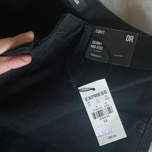 Jeans black , size 0 regular, curve skinny mid rise!